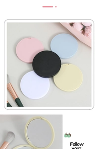 Macro view of portable foldable compact mirrors in pastel colors with matte finish