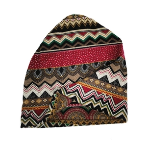 Detailed knit texture and vibrant bohemian geometric patterns on this ethnic winter beanie