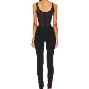 Sexy black backless jumpsuit with mesh panels and cut-out waist back view for women