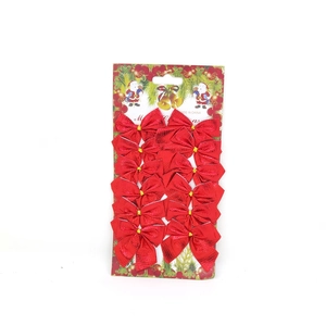 Set of 12 red glitter Christmas tree bow decorations on card packaging