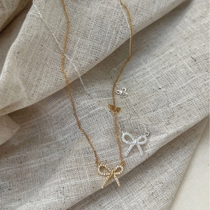 Elegant 925 sterling silver double bow pendant necklace with sparkling zircon stones
