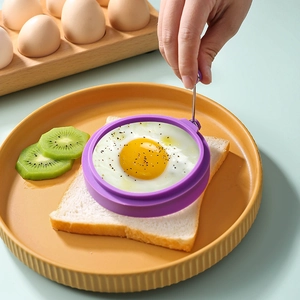 Purple silicone round egg ring with handle for frying sunny-side up eggs on toast