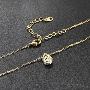 Elegant gold-plated waterdrop pendant necklace with lobster clasp on black background