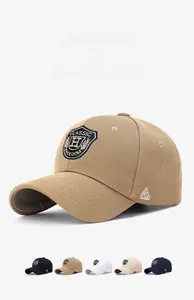 Detailed view of structured baseball cap with classic H letter shield embroidery