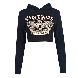 Flat lay of a black cropped hoodie featuring vintage motorcycle graphic and white lettering