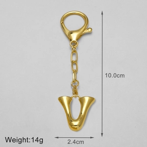 Detail of 18k gold letter U keychain with lobster clasp, dimensions 10cm by 2.4cm