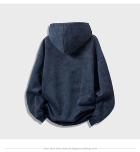 Detailed back view of navy blue oversized hoodie with washed vintage texture