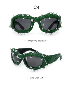 Front and side view of punk sunglasses with dark green frames and silver metal studs
