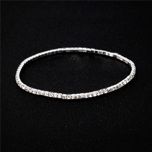 Detail shot of a 2mm silver stretch bracelet with single row sparkling rhinestones