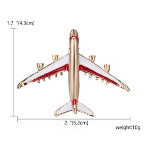 Detailed view of alloy airplane brooch with enamel finish and size dimensions