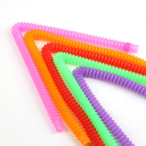 Five colorful plastic pop tubes in a bent shape for sensory and stress relief play