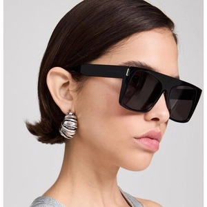 Chic Y2K black square wrap sunglasses with silver metallic temple details on model