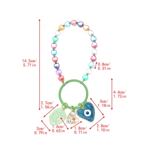 Detailed view of evil eye keychain with colorful beads and measurement dimensions