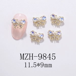 Hollow gold butterfly nail charm with iridescent rhinestones in 11.5x9mm size