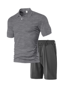 Detail of grey men's polo set with waffle texture shorts and elastic drawstring waist