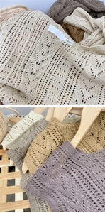 Detail of knitted shoulder wrap neck tag and variety of elegant neutral color options