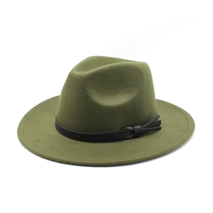 Detail of olive green felt jazz hat featuring black faux leather band and bow accent