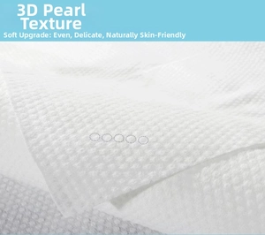 Macro shot of 3D pearl texture on disposable towel for enhanced cleaning and softness