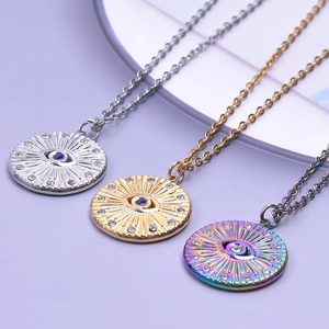 Minimalist evil eye pendant necklace set in gold, silver, and rainbow colors with crystals