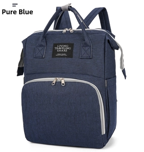 Front side view of blue waterproof Oxford cloth diaper bag with large zipper opening