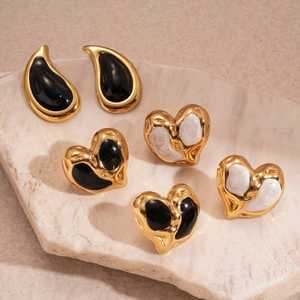 Vintage heart and waterdrop gold earrings set with black and marble enamel details