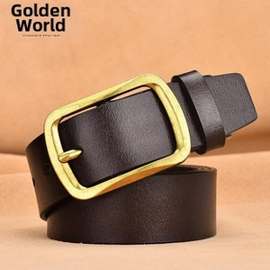 Detail of dark brown leather belt with retro brass pin buckle and fine grain texture