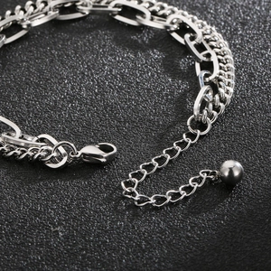 Detail of silver double-layered chain bracelet with lobster clasp and extension link
