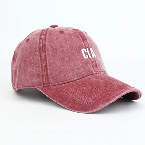 Detailed close-up of CIA letter embroidery on deep red washed cotton baseball cap