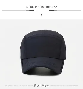 Close-up of a navy blue 5-panel flat brim cap with detailed stitching and durable fabric