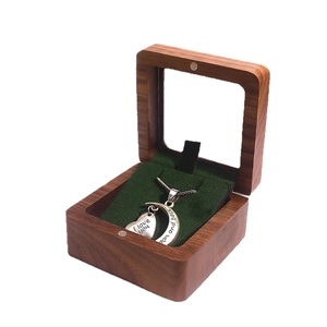 Walnut wood jewelry box with heart and moon pendants engraved I love you to the moon and back