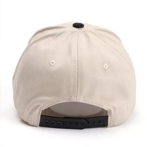 Back view of beige and black contrast baseball cap with adjustable snapback closure