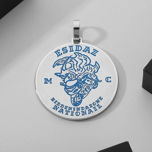 Detail of round punk motorcycle pendant with blue reflective finish and engraving