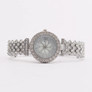 Elegant silver women's quartz watch with rhinestone floral dial and sparkling metal band