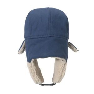 Navy blue trapper hat with white faux shearling lining and adjustable ear flaps for winter