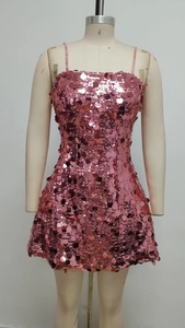 Detail of pink sequin bodycon mini dress featuring thin straps and shimmering fabric