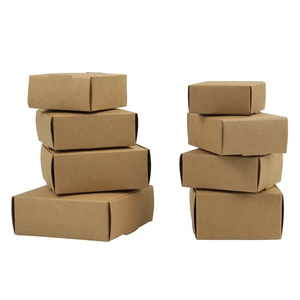 Brown kraft paper folding gift boxes stacked in various sizes on a white background