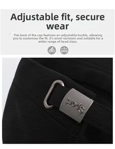Detail of adjustable metal buckle with Sport engraving on black outdoor flat top cap