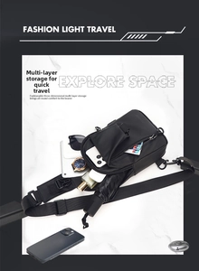 Detail view of internal compartments of the black chest bag filled with travel essentials