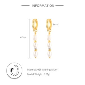 Detail view of gold S925 silver pearl drop earrings with 42mm length and 9mm hoop size