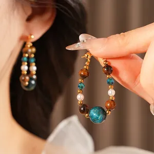 Boucles d'oreilles bohèmes vintage avec œil de tigre et perle goutte en fini doré