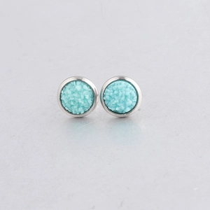 Macro shot of 8mm round blue druzy earrings with silver stainless steel setting