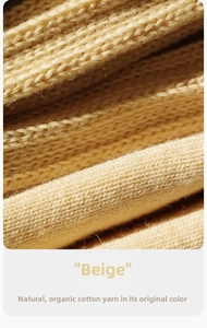 Détail macro du tricot en coton bio beige naturel pour chaussettes rétro au style Amekaji