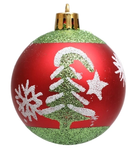 Detailed close-up of a red Christmas ball with green glitter stripes and white snowflake patterns