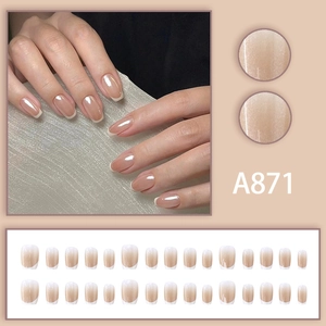 Square French press-on nails with shimmering pearlescent nude base and white tips