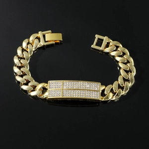 Hip-hop gold Cuban link bracelet with a sparkling crystal rectangular plate on black