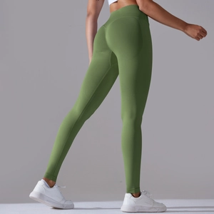 Detail view of olive green high-waisted seamless leggings with scrunch butt lift design