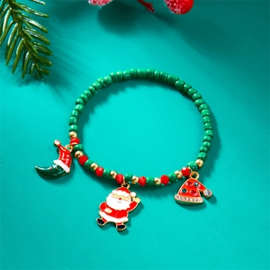 Detailed view of Christmas beaded bracelet with Santa Claus, hat and moon pendants