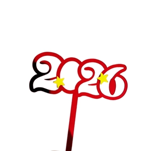 Detailed close-up of 2026 red and white acrylic cake topper with small yellow stars