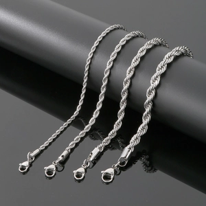 Detail view of four silver stainless steel twisted rope chains in varying thicknesses