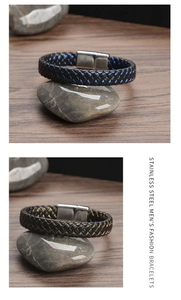 Detail of woven leather bracelets with magnetic stainless steel clasps on pebbles